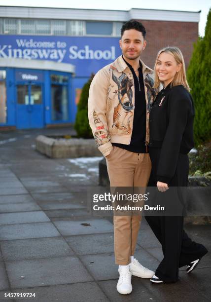 Actor Adam Thomas and wife Caroline Daly visit their former secondary school, The Kingsway School, on January 20, 2023 in Manchester, England.