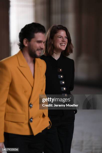 Kit Harington seen wearing a yellow blazer jacket, black pants and Rose Leslie seen wearing a black blazer and black pants outside the Louis Vuitton...