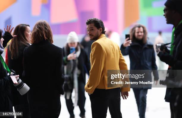 Kit Harington seen wearing a yellow blazer jacket, black pants and Rose Leslie seen wearing a black blazer and black pants outside the Louis Vuitton...