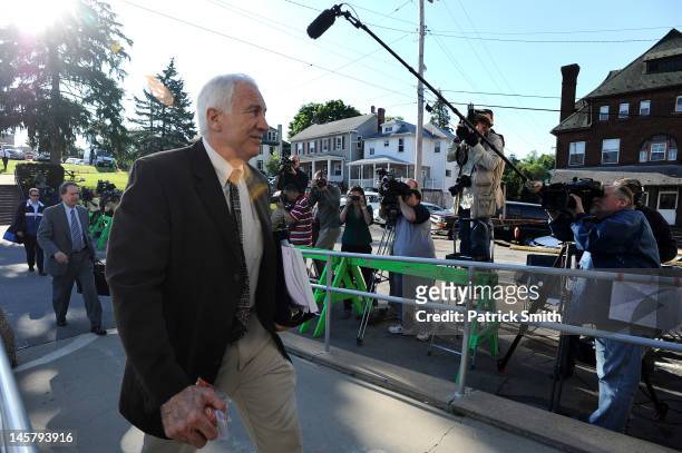 Former Penn State assistant football coach Jerry Sandusky and Joe Amendola, attorney for Jerry Sandusky , enter the Centre County Courthouse after...