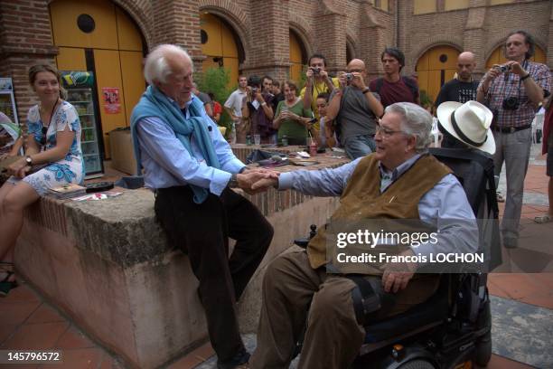 American famous photographer David Douglas Duncan and famous German photographer Horst Faas during 'Visa pour l'image' on September 6, 2008 in...