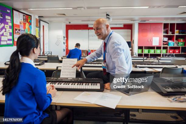 students enjoying music class - school building stock pictures, royalty-free photos & images