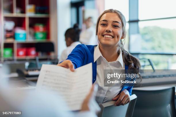 student sharing sheet music - secondary school building stock pictures, royalty-free photos & images