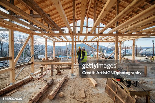 Construction workers in building site. Construction workers in building site.