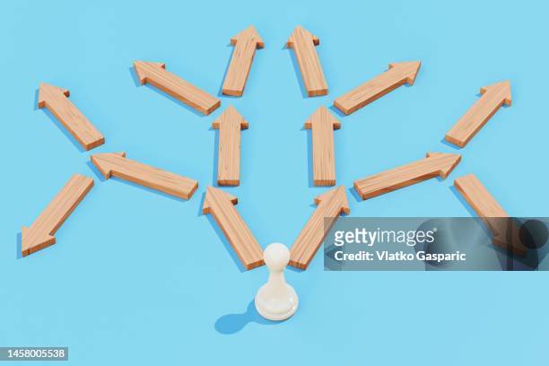white pawn choosing between multiple branching paths to follow - signaling pathways stock pictures, royalty-free photos & images