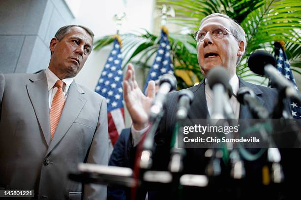 Senate Minority Leader Mitch McConnell speaks during a brief press conference with Speaker of the House John Boehner after the weekly House GOP...