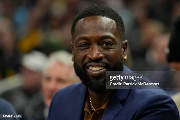 Former NBA and Marquette Golden Eagles player Dwyane Wade reacts during the first half of the game between the Providence Friars and Marquette Golden...
