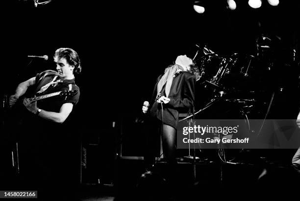 American Rock musicians Neil Giraldo, on electric guitar, and Pat Benatar perform onstage at My Father's Place, Roslyn, New York, January 2, 1980.