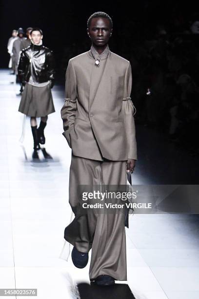 Model walks the runway during the Dior Homme Ready to Wear Fall/Winter 2023-2024 fashion show as part of the Paris Men Fashion Week on January 20,...