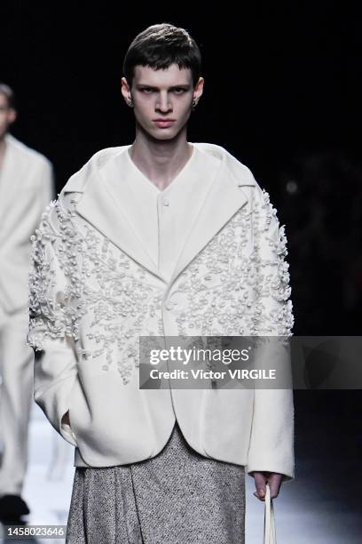 Model walks the runway during the Dior Homme Ready to Wear Fall/Winter 2023-2024 fashion show as part of the Paris Men Fashion Week on January 20,...