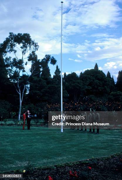 General view of a flag presentation, part of the county's formal independence ceremony, Harare, Zimbabwe, April 18, 1980. Among those visible are...