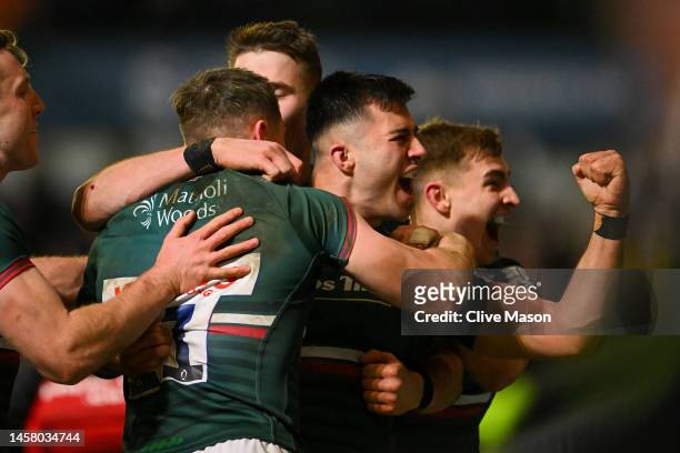 Dan Kelly of Leicester Tigers celebrates the try of team mate Harry Simmons during the Heineken Champions Cup Pool B match between Leicester Tigers...