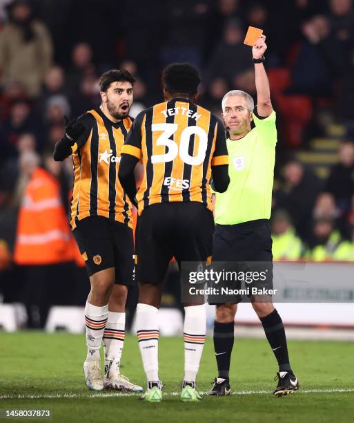 Benjamin Tetteh of Hull City is shown a red card by the Match Referee, Darren Bond during the Sky Bet Championship match between Sheffield United and...