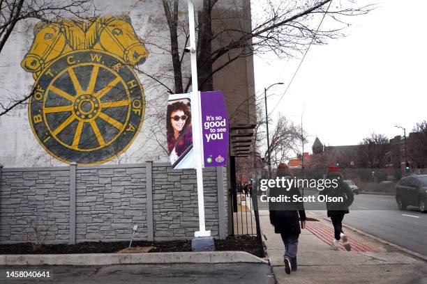 People walk past a Teamsters sign on January 20, 2023 in Chicago, Illinois. Despite unions adding more than 270,000 workers to their ranks in 2022,...