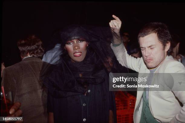 Jamaican-born singer and model Grace Jones and Franch artist Jean-Paul Goude dance at Studio 54, New York, New York, 1979.