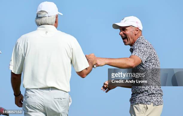 Fred Couples and Rocco Mediate on the second tee box share a laugh during the second round of the Mitsubishi Electric Championship at Hualalai at...