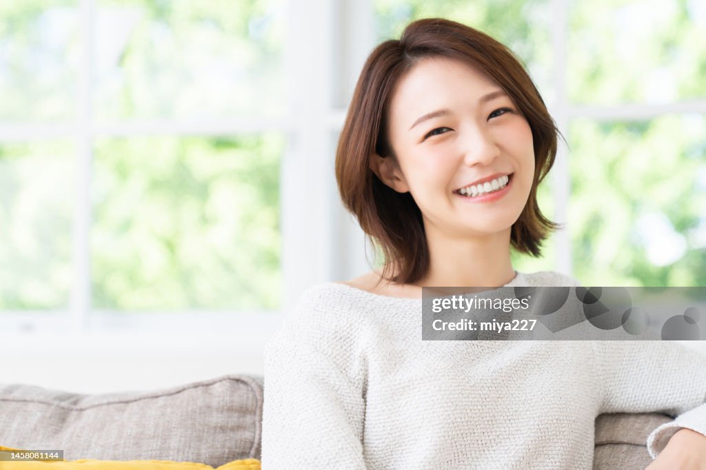 Attractive asian woman relaxing