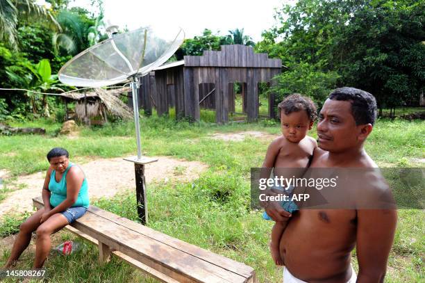 Marino Felix, a Juruna indian, talks to AFP in his community about how much their life will be affected by the construction of the Belo Monte...