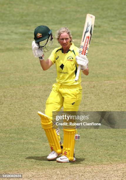 Beth Mooney of Australia celebrates after scoring her century during game three of the Women's One Day International Series between Australia and...