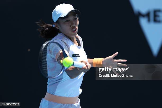 Shuai Zhang of China plays a forehand during the third round singles match against Katie Volynets of the United States during day six of the 2023...