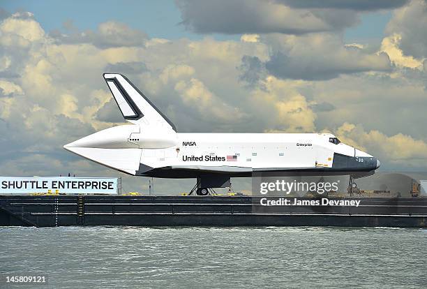 Space Shuttle Enterprise is transported to the Intrepid Sea, Air & Space Museum on June 6, 2012 in New York City.