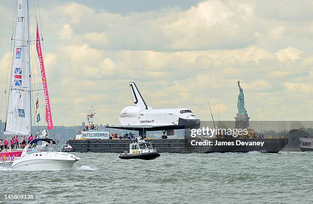 Space Shuttle Enterprise is transported to the Intrepid Sea, Air & Space Museum on June 6, 2012 in New York City.
