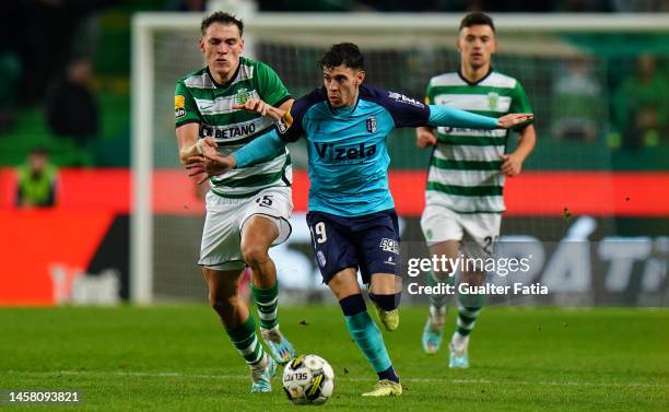 Nuno Moreira of FC Vizela with Manuel Ugarte of Sporting CP in action during the Liga Bwin match between Sporting CP and FC Vizela at Estadio Jose...