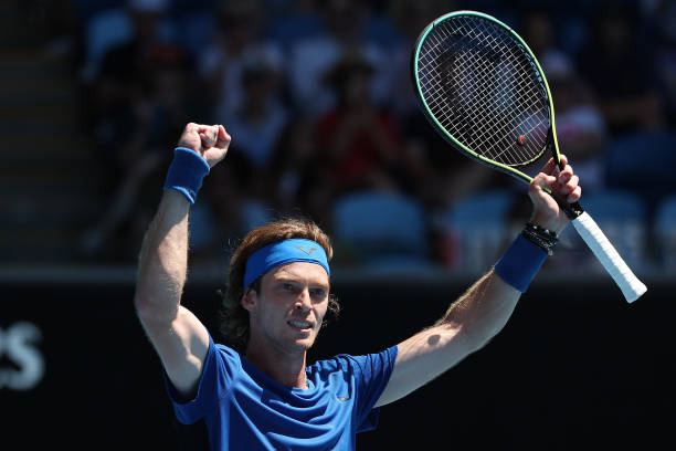 Andrey Rublev celebrates match point during the third round singles match against Daniel Evans of Great Britain during day six of the 2023 Australian...