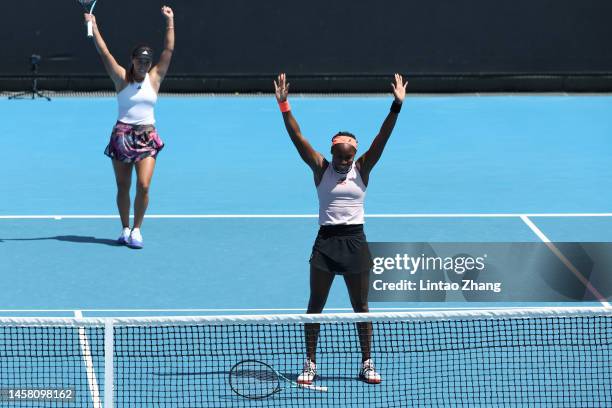 Coco Gauff of the United States and Jessica Pegula of the United States celebrate match point during the second round doubles match against Moyuka...