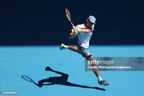 Alex de Minaur of Australia plays a backhand during the third round singles match against Benjamin Bonzi of France during day six of the 2023...