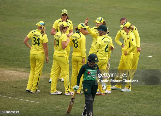 Australia celebrate the run out of Sadaf Shamas of Pakistan during game three of the Women's One Day International Series between Australia and...