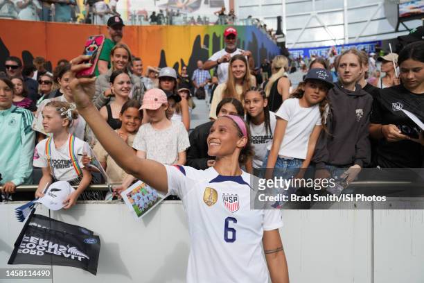 Lynn Williams of the United States takes selfies with fans after a game between New Zealand and USWNT at Eden Park on January 21, 2023 in Auckland,...