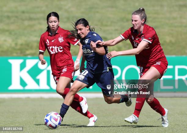 Alexandra Carla Chidiac of Melbourne Victory and Nanako Sasaki of Adelaide United and Chelsea Dawber of Adelaide United during the round 11 A-League...