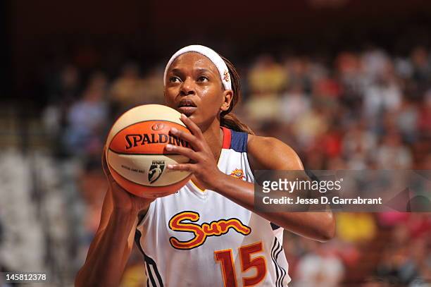 Asjha Jones of the Connecticut Sun prepares to shoot a foul shot while playing against the New York Liberty on May 20, 2012 at the Mohegan Sun in...