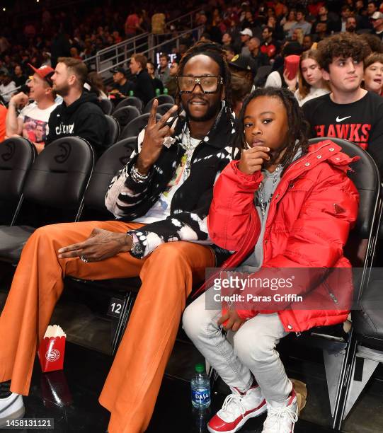 Rapper 2 Chainz and his son Halo Epps attend the game between the New York Knicks and the Atlanta Hawks at State Farm Arena on January 20, 2023 in...