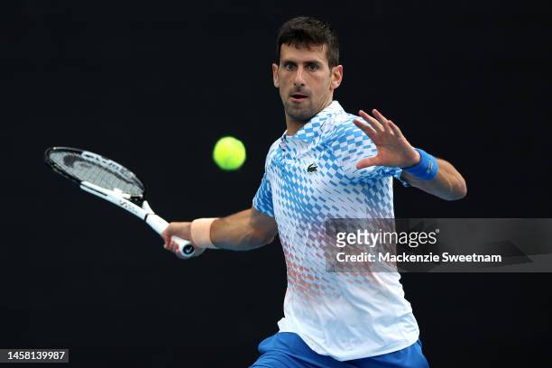Novak Djokovic of Serbia plays a forehand during the third round singles match against Grigor Dimitrov of Bulgaria during day six of the 2023...