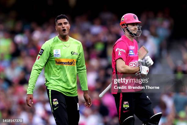 Gurinder Sandhu of the Thunder celebrates after claiming the wicket of Kurtis Patterson of the Sixers during the Men's Big Bash League match between...