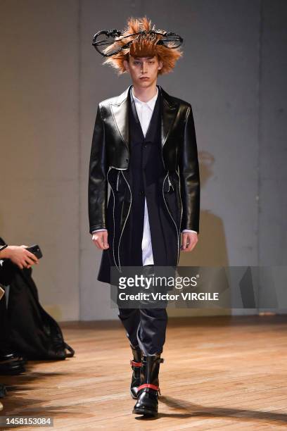 Model walks the runway during the Comme des Garcons Homme Plus Ready to Wear Fall/Winter 2023-2024 fashion show as part of the Paris Men Fashion Week...