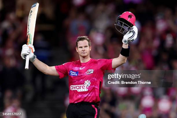 Steve Smith of the Sixers celebrates scoring his century during the Men's Big Bash League match between the Sydney Sixers and the Sydney Thunder at...