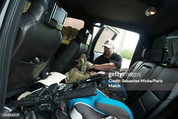 Former Navy SEAL and expert sniper, Chris Kyle, is photographed on his ranch for Paris Match magazine on April 2, 2012 in Dallas, Texas. In this...