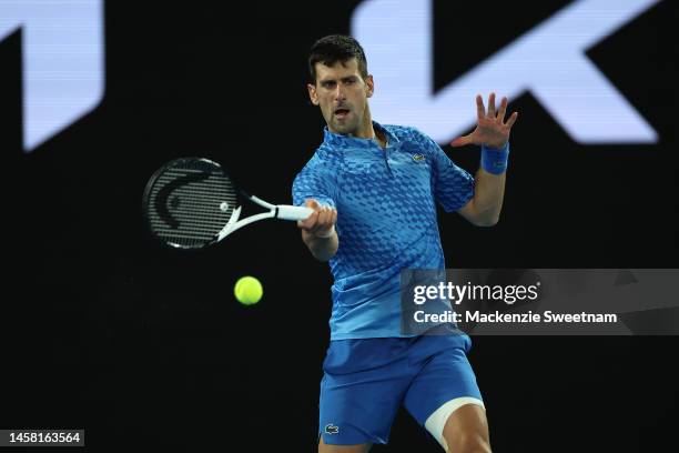Novak Djokovic of Serbia plays a forehand during the third round singles match against Grigor Dimitrov of Bulgaria during day six of the 2023...
