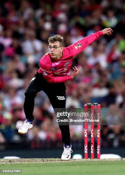 Todd Murphy of the Sixers bowls during the Men's Big Bash League match between the Sydney Sixers and the Sydney Thunder at Sydney Cricket Ground, on...