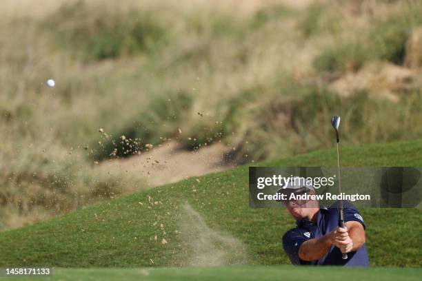 Ryan Fox of New Zealand plays a bunker shot on the seventh hole during day three of the Abu Dhabi HSBC Championship at Yas Links Golf Course on...