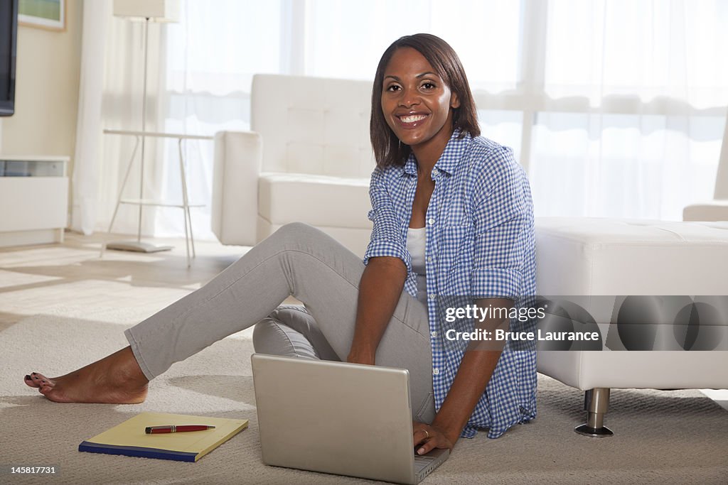 African American woman working at home