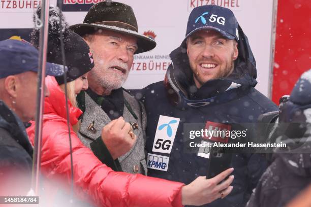 Arnold Alois Schwarzenegger talks to Aleksander Aamodt Kilde of Norway and Lindesey Vonn during the Men's Downhill of the Audi FIS Alpine Ski World...