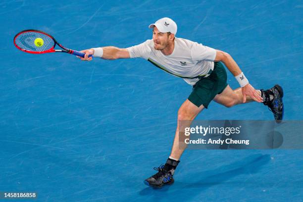 Andy Murray of Great Britain lunges to play a forehand during the third round singles match against Roberto Bautista Agut of Spain during day six of...