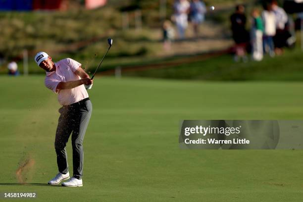 Victor Perez of France plays his third shot on the 18th hole during the day three of the Abu Dhabi HSBC Championship at Yas Links Golf Course on...