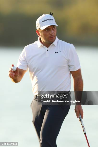Francesco Molinari of Italy acknowledges the crowd on the eighteenth green during day three of the Abu Dhabi HSBC Championship at Yas Links Golf...