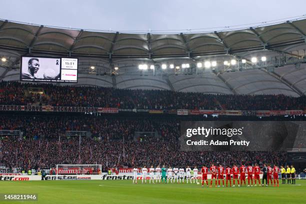 General view as players of VfB Stuttgart and 1.FSV Mainz 05 hold a minutes silence in memory of former Brazil player Pele prior to during the...