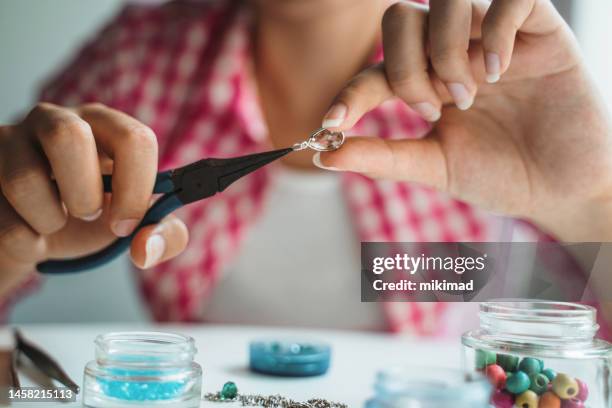 beautiful girl making handmade gemstone jewelry, home workshop. art, hobby, handcraft concept. - jewellery making stock pictures, royalty-free photos & images